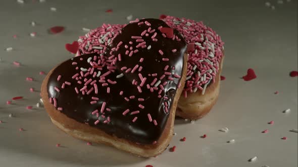 Doughnuts falling and bouncing in ultra slow mo 1500fps - reflective surface - DOUGHNUTS PHANTOM 