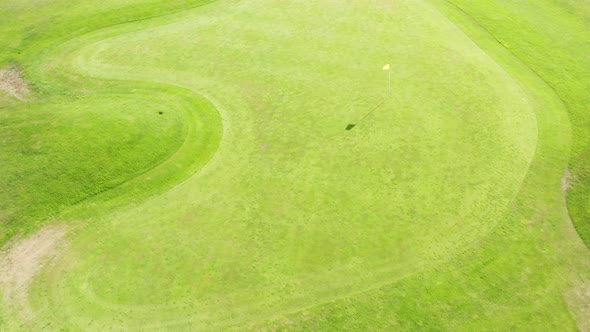 Large Empty Area Prepared for Golf Game on Sunny Day