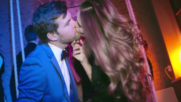 Kissing at Party