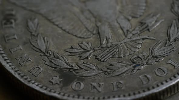 Rotating stock footage shot of antique American coins - MONEY 0126