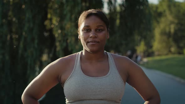 Portrait of African American woman during the workout at park