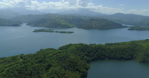 Scenic view of pristine blue water lakes, untouched green hills with Cordillera Central (Hispaniola)