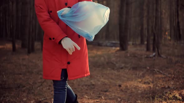 Eco Activist Collecting Trash.Clean Collects Garbage Plastic Empty Bottles.