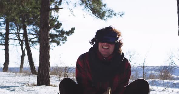 Attractive Man with a Large Smile on the Sleigh in