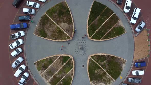 Birds eye drone shot of Muizenberg, Cape Town - drone is closely ascending over the famous Surfers C