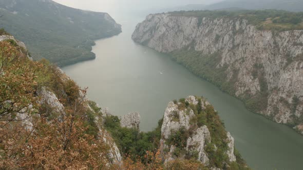 Slow tilt on    Serbian and Romanian state border  4K 2160p 30fps UltraHD footage - Danube river gor