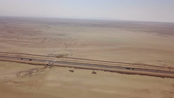 Dusty Highway on the Oriental, Yellow Desert in Iran