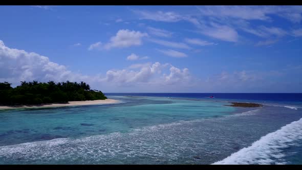 Aerial above nature of tranquil coast beach trip by aqua blue lagoon with white sandy background of 