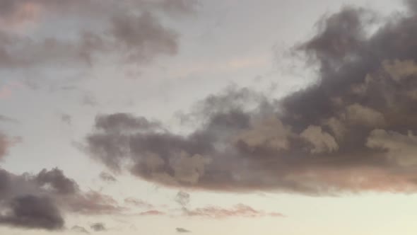 Timelapse Of Clouds Moving In The Sky During Sunset.