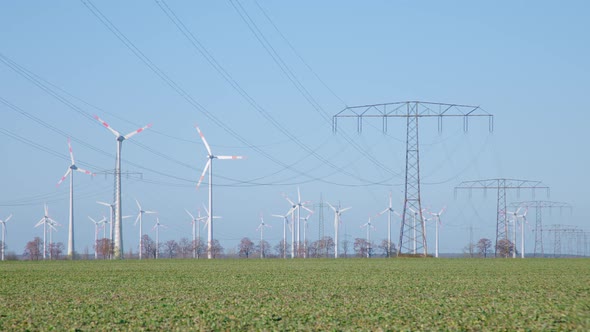 Time lapse Energy Landscape with Wind Turbines and Electricity Pylon