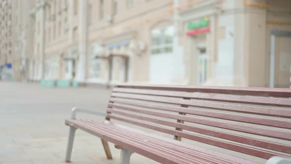 Old Woman Coming Sitting on Bench and Opening Laptop