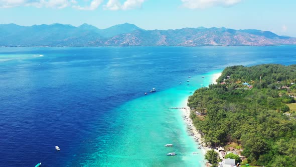 Aerial flying over nature of relaxing seashore beach journey by aqua blue water and white sand backg