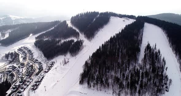 Aerial View of the Ski Resort in Mountains at Winter