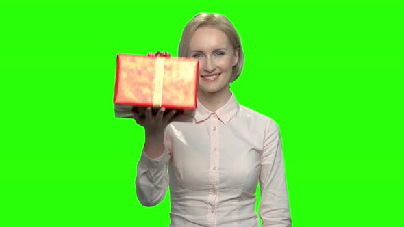 Businesswoman with Red Gift Box and Thumb Up