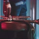 Close up of a trumpet on the stool and a man touching it - VideoHive Item for Sale