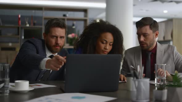 Diverse Finance Team Brainstorm in Office