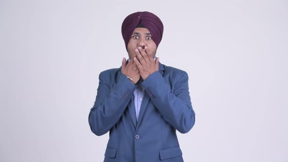 Bearded Indian Sikh Businessman Looking Shocked