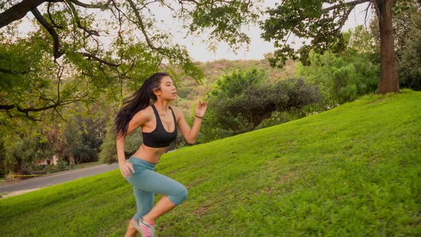 Athletic Woman Running Morning Hill