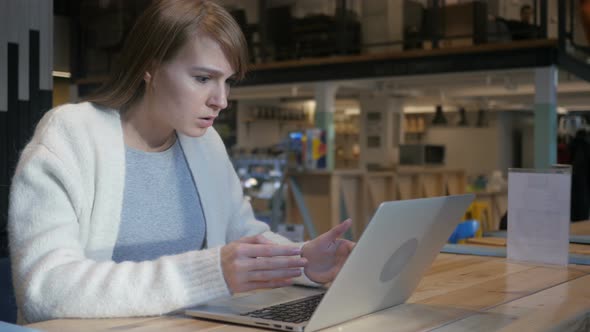 Displeased, Angry Man Reacting to Problems of Work in Cafe