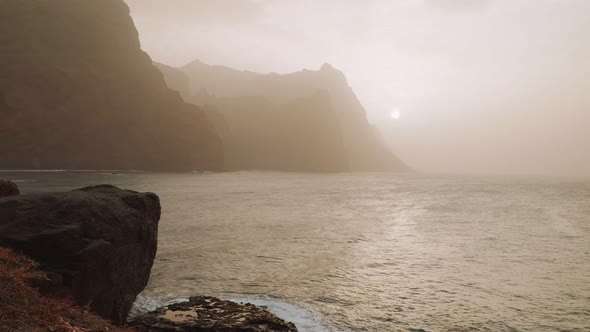 Amazing Silhouette of Huge Cliffs By Sunset in the Dust