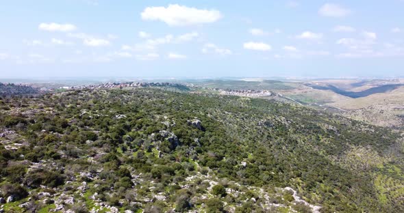 Aerial View of the landscape of the wooded hills and the paths, Bi'r Saricah.