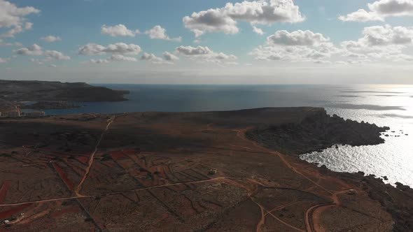 Aerial drone video from northern Malta near the Ghajn Znuber Tower.