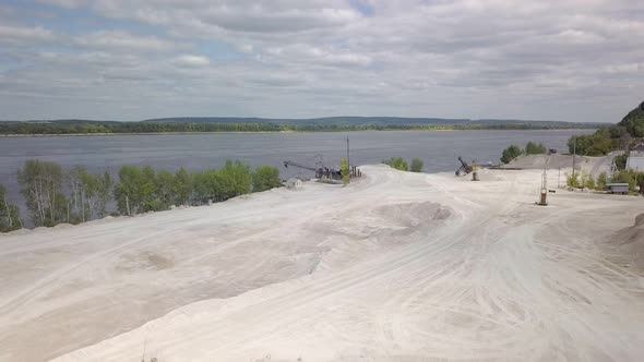 Aerial View of Quarry of Mining Limestone and Girl Sitting on Mount