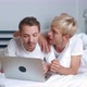 Two Male Gay Couple Using Laptop Computer for Video Calling Talking Distantly with Friends - VideoHive Item for Sale