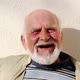 Old happy grandfather with white beard laughs, Slow motion - VideoHive Item for Sale