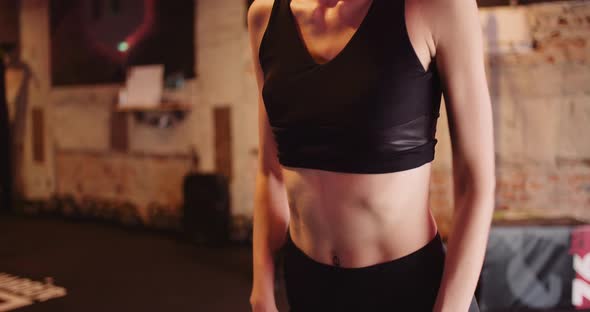 Female Athlete Doing Workout At Health Club