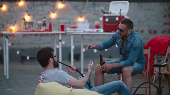 Male Friends Chilling on Rooftop