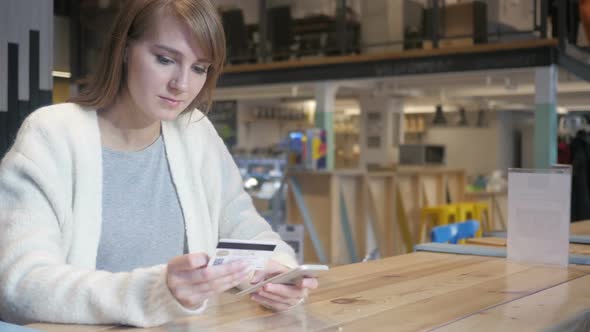 Woman Reacting to Successful Online Shopping on Smartphone