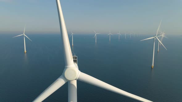 Huge Windmill Turbines Offshore Windmill Farm in the Ocean Westermeerwind Park Windmills Isolated at