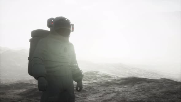 Astronaut on Another Planet with Dust and Fog alt