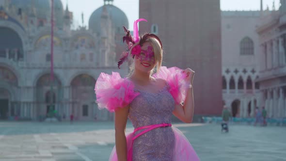 Smiling Girl with Carnival Mask in Front of St