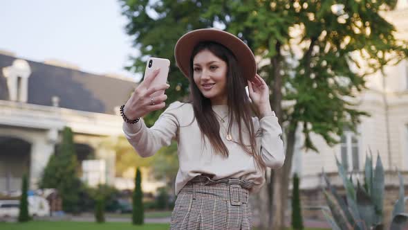 Happy Cheerful Lady in Trendy Hat and Clothes Which Making Funny Selfie