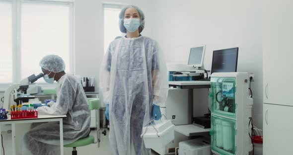 A Team of Laboratory Technicians Work in a Modern Wellequipped Laboratory