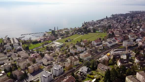 Aerial drone view of the leman Lake,Vaud, Switzerland in Lausanne with harbor and vineyards