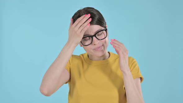 Stressed Young Woman Having Headache on Purple Background