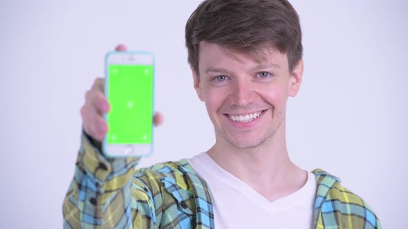 Face of Happy Young Handsome Man Showing Phone