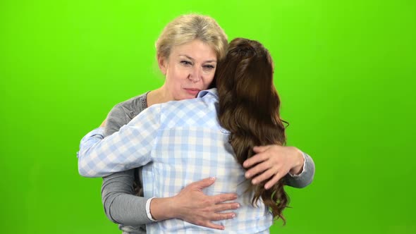 Native Hugs, They Are Stand and Talking. Green Screen