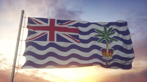 Flag of British Indian Ocean Territory Waving in the Wind Sky and Sun Background