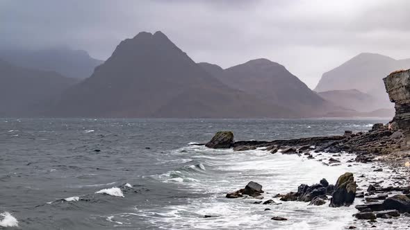 Elgol Beach at Port Na Cullaidh with Red Cuillin Mountains Under Clouds on Loch Scavaig Scottish