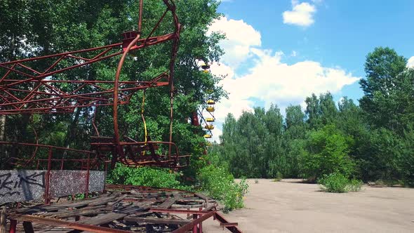 Abandoned Pripyat Amusement Park Rides and Ferris Wheel Chernobyl Ukraine