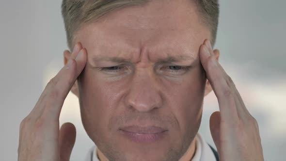 Close Up of Stressed Man Face with Headache