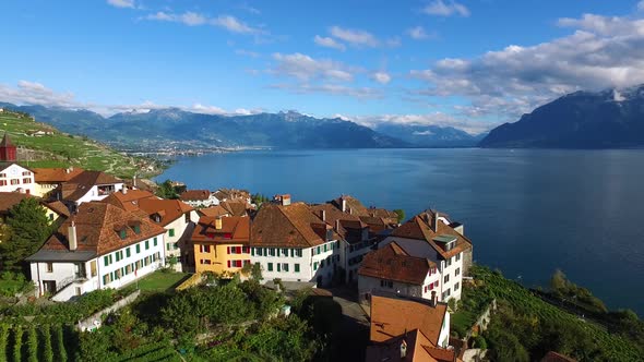 Drone shot of a typical village in the Lavaux wineyard, Switzerland next to Lake LémanShot on Inspi