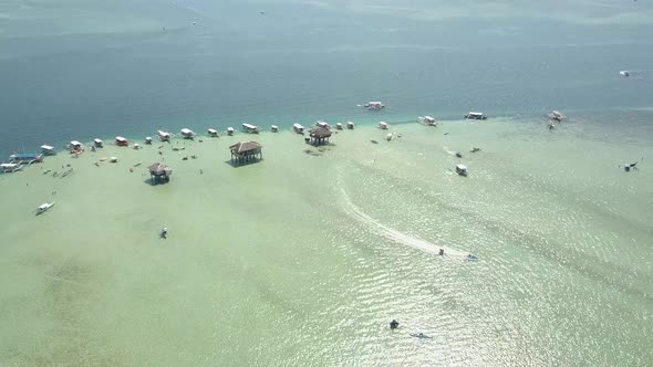 Luxury Resort on Philippines Islands, Bungalows and Boats in Ocean, Aerial View.