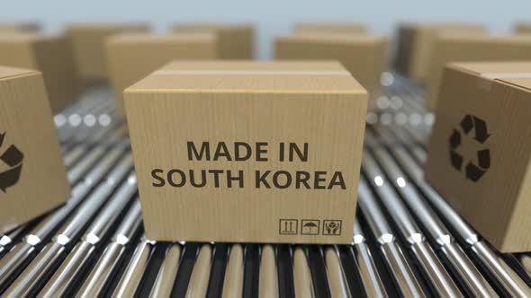 Boxes with MADE IN SOUTH KOREA Text on Conveyor