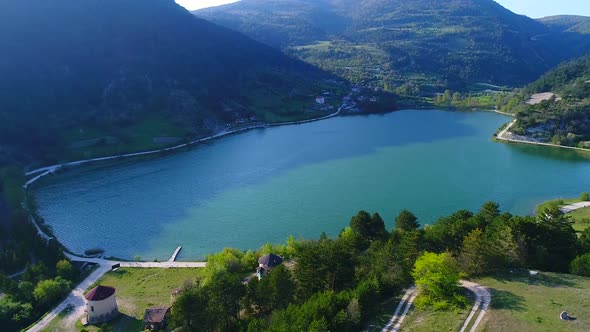 Old mills, lake and village.