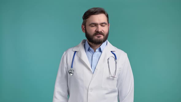 Portrait of Doctor in Professional Medical White Coat Showing No Head Sign Negation Gesture